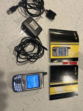 700wx Palm Treo By Palm. Includes Charging Cable Sync Manuals And Pen