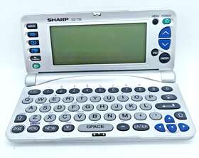 Oz-730 Sharp Wizard Electronic Computer Organizer Hand Held Color Silver Vintage