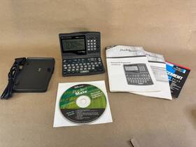 Texas Instruments 033317196647 Pocket Mate 400 Organizer With Manuals Software Disk And Base