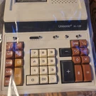 Vintage Unisonic XL-129 Calculator With Case Instructions & Box. Powers Up. Fixed Price $13.64.