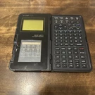 Untested Vtg Sharp OZ-7000 Wizard Electronic Organizer Parts Only Repair. Fixed Price $18.00.