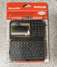 Vintage Sharp YO-370CP Electronic Organizer 128KB Pda Calculator Sealed. Fixed Price $29.99.