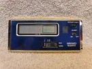 Vintage Gold Tone & Blue Seiko Quartz Travel Digi Alarm Clock 7411-003L. Fixed Price $18.00.