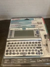 Vintage Sharp Wizard OZ-730 Electronic Organizer Pocket Computer Factory Sealed. Fixed Price $100.00.