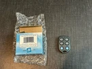X-10 Powerhouse Slimfire Keychain Wireless Remote KR19A. Fixed Price $6.85.