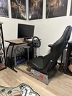 Sim Racing Rig With Fanatec V3 Pedals And Logitec Wheel. Fixed Price $600.00.