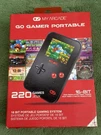 Dreamgear Gogamer 220-GAME System Red. Fixed Price $15.00.