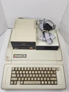 Vintage Apple Iie A2S2064 Computer W/ Disk Drives Powers On. Fixed Price $245.00.