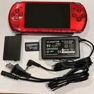 Radiant Red Psp 3000 System W/ 64GB Memory Card & Charger Bundle Import. Fixed Price $148.00.