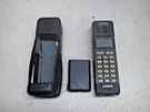 Vintage Uniden Mobile Phone Model: CP5000 (unit And Leather Cover Only). Fixed Price $49.99.