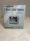Living Solutions 5 Inch Black& White Am/fm Radio Television Silver/new ATC-033. Fixed Price $50.00.