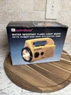 Vintage New Windsor Water Resistant Flash Light Amfm Radio Electric Siren FL-245. Fixed Price $48.00.
