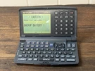 Vintage 1997 Sharp ZQ-5400 129KB Personal Electronic Organiser For Parts Repair. Fixed Price $14.30.