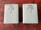 Pair Sprague 8-8-4UF 650 Vdc Oil Filled Capacitors. Fixed Price $40.00.