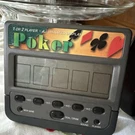 Vintage Radio Shack Electronic Draw Poker Handheld Game 1 Or Players 60-2699. Fixed Price $15.00.