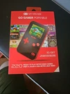 Dreamgear Gogamer 220-GAME System Red. Fixed Price $10.00.