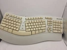Vintage Microsoft Keyboard Natural Elite Ergonomic PS/2 X03-51764 E06401PS2. Fixed Price $35.99.
