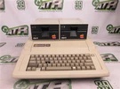 Apple Iic A2S2064 Desktop 128KB Dual 5.25 Floppy Drives Basic. Fixed Price $399.99.