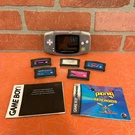 Nintendo Game Boy Advance Clear Glacier Console + 5 Bundle Tested Vintage. Fixed Price $115.00.
