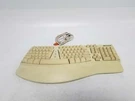 Vintage Microsoft Keyboard Natural Elite Ergonomic PS/2 X03-30785 E06401COMB. Fixed Price $34.29.