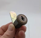 National C8053 Cam Lock Antique Brass 1-3/16" 3/4" Dia Straight Formed. Fixed Price $13.49.