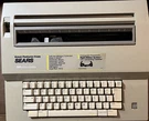 Vintage Sears Sr 1000 Series Electronic Scholar Portable Typewriter 5ASJ W/ink. Fixed Price $35.00.