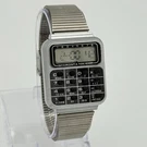Vintage Micronta Radio Shack Men's Silver Tone Calculator Phone Memory Watch. Fixed Price $49.99.