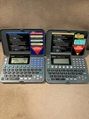 2 Royal Personal Organizers, DM80NX W/glow Display & DM70EX, Both New. Fixed Price $10.00.