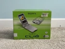 Sony Cli PEG-NR70V/U Personal Entertainment Organizer Pda Mint Cib Complete Box. Fixed Price $259.99.