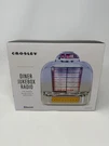 Crosley Diner Jukebox Tabletop Bluetooth Radio Chrome Plated CR1120A-SI New***. Fixed Price $35.00.