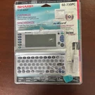 Vtg Sharp Wizard OZ-730PC Electronic Personal Organizer 9+ Features In Package. Fixed Price $89.56.