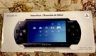 Sony PSP-1001K Console Value Pack W/ Charger, Tectra Battery, Case & 8 Games. Fixed Price $150.00.