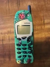 Vintage Nokia 5165 Cell Phone NSW-1NX Cingular Blue Not Tested. Fixed Price $24.00.