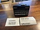 Sony Walkman Wm AF64 Vintage Radio Cassette Player For Parts Only With Manual. Fixed Price $50.00.