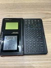 Vintage Sharp OZ-7000 Wizard Electronic Organizer Calculator. Fixed Price $24.00.