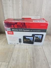 Rca DRC69705E22 Dual 7" Screen Mobile Dvd Player System W/ Remote Tested. Fixed Price $39.99.