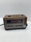 Vintage General Electric 7-4601A Woodgrain Finish Am Fm Alarm Snooze Works. Fixed Price $23.99.