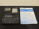 Sharp OZ-7600 Wizard 32KB Electronic Organizer W/ Manual. Fixed Price $29.99.