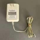Radio Shack White Adapter 273-1779 120VAC 60HZ 28W 12V Dc 1500MA. Fixed Price $15.99.