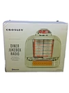 Crosley Diner Jukebox Tabletop Bluetooth Radio Chrome Plated CR1120A-SI Silver. Fixed Price $50.00.