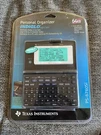 New Sealed Texas Instruments PS-6960SI Personal Organizer Calendar Indiglo. Fixed Price $19.99.