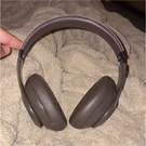 Brown Over-ear Headphones Headband Double Ear-cup Stereo Audio. Fixed Price $80.00.