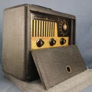 1948 Stewart-warner Model A61P1 Ac/battery Portable Radio. Fixed Price $24.95.