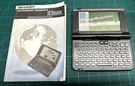 Vintage Fun: Collectable Sharp IQ-8900G Electronic Organizer Pda German Model. Fixed Price $35.00.