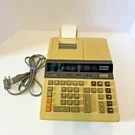 Canon CP1213D Black/red Commercial Desktop Printing Calculator W Carrying Handle. Fixed Price $34.99.